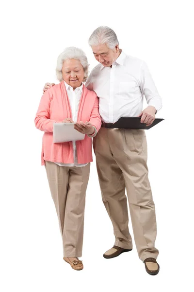 Senior Couple Holding Questionnaire — Stock Photo, Image