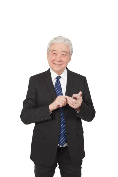 Senior Affärsman Som Håller Smart Telefon — Stockfoto