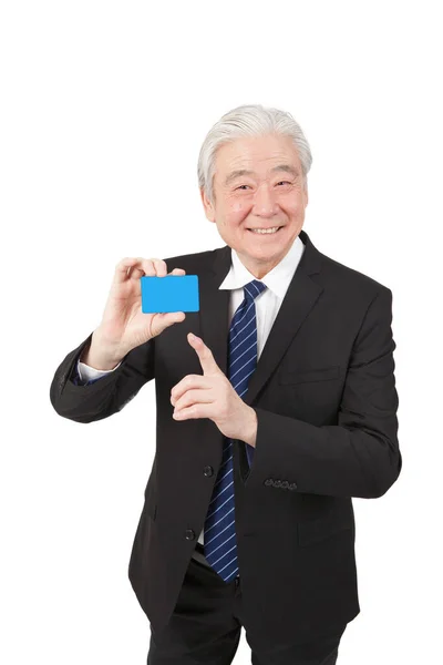Starszy Przedsiębiorca Posiadający Wizytówkę — Zdjęcie stockowe