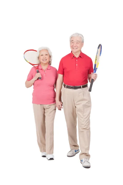 Coppia Anziana Con Racchette Tennis — Foto Stock