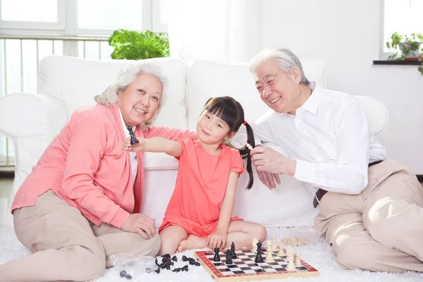 Senior Couple Granddaughter Playing Game — Stock Photo, Image