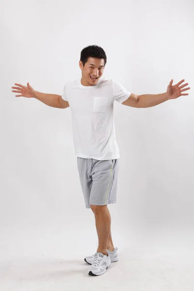 Young Man Jumping Casual Clothes — Stock Photo, Image
