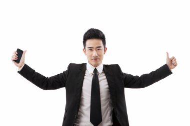 Cep telefonu olan bir iş adamı.