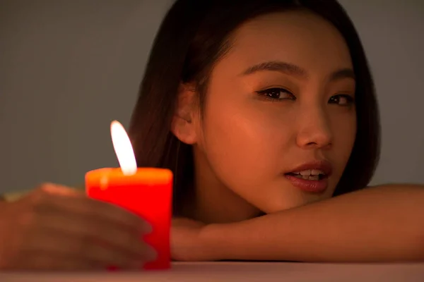 Young Woman Holding Red Candle — Stock Photo, Image