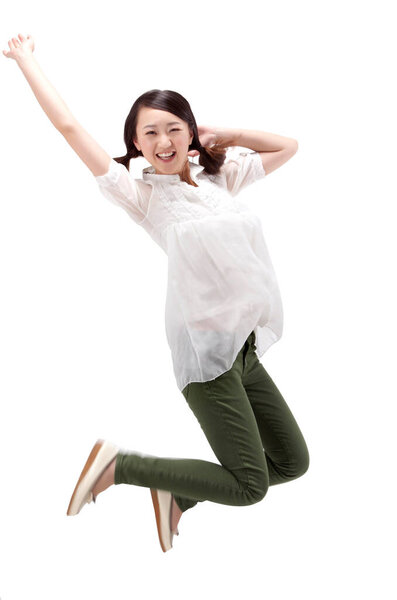 Oriental fashion young girl jumping