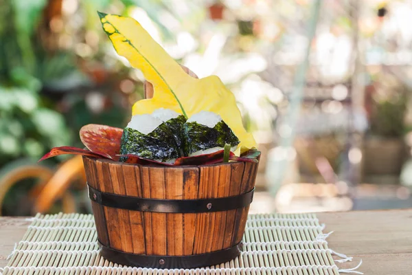 rice ball food design in wood bucket