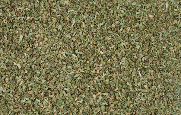 Dry Oregano herb on texture background
