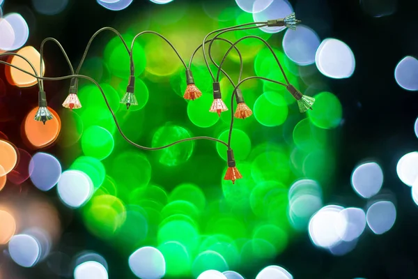 Kerstdecoratie Verlichting Gloeien Achtergrond Wazig — Stockfoto