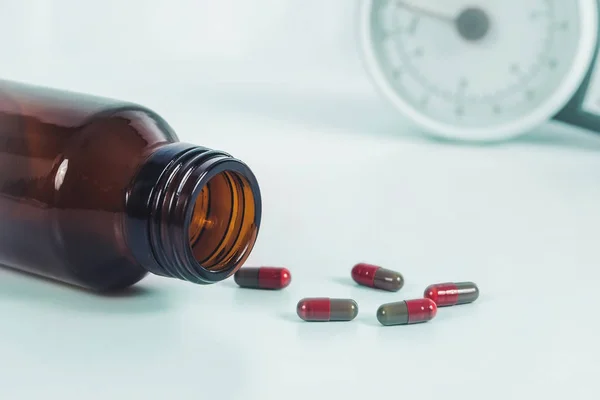 Drug Capsule Spilled Out Bottle Laboratory Table — Stock Photo, Image