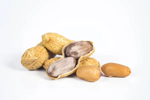 Peanuts in shells on white background. — Stock Photo, Image