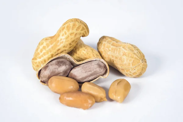 Peanuts in shells on white background. — Stock Photo, Image