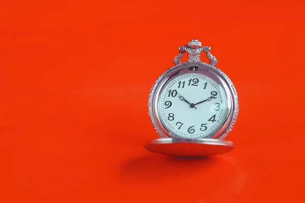 Vintage pocket watch on color background. — Stock Photo, Image