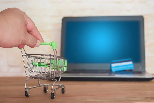 Shopping cart On Laptop Keyboard With Credit Card, Online Shoppi