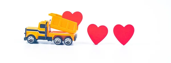 Truck car carry a red hearts sign on white background.Valentine — Stock Photo, Image