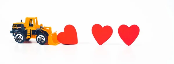 Truck car carry a red hearts sign on white background.Valentine — Stock Photo, Image