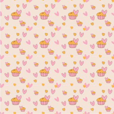 Arka planda kalp ile küçük cupcake.