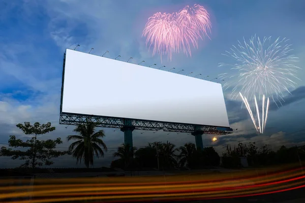 White advertising billboard on blue sky with fire work . — Stock Photo, Image