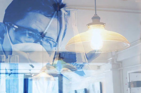 Double exposure scientist in laboratory to research with test tu — Stock Photo, Image