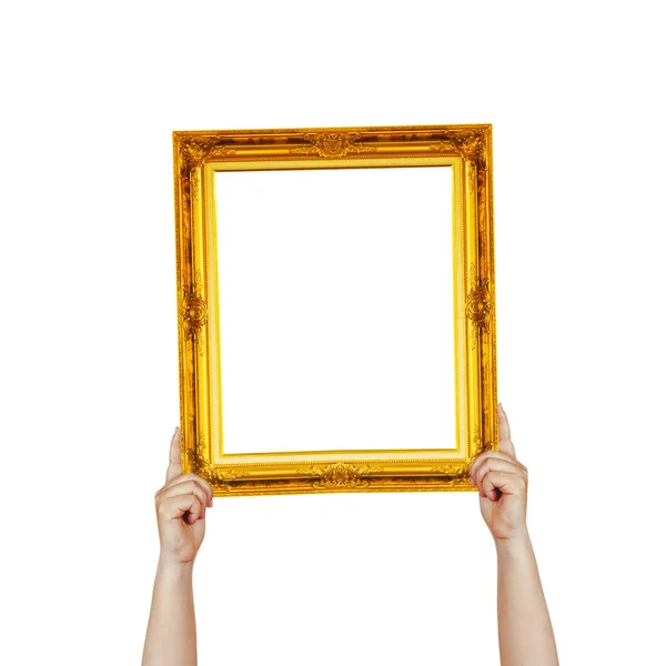 Hand hold vintage color golden picture frame on white background — Stock Photo, Image