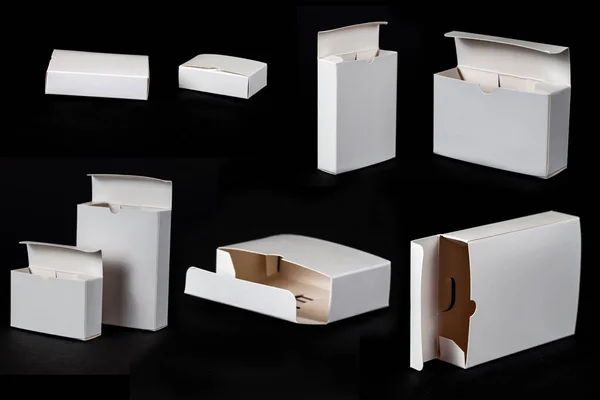 White paper box on black background — Stock Photo, Image