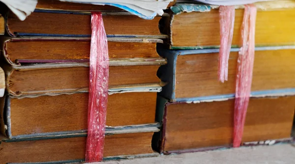 Stack of old and used books or text books lying on wooden. — Stock Photo, Image