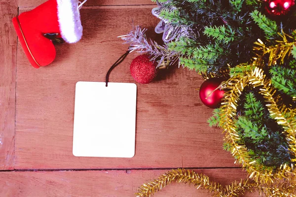 White bank card with christmas decoration on rustic wooden table — Stock Photo, Image