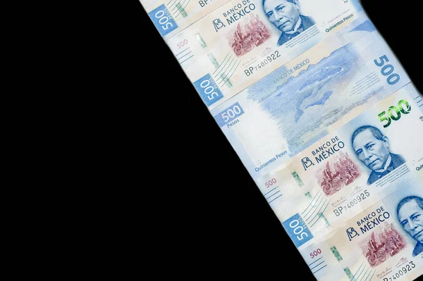 Mexicaans geld op zwarte achtergrond — Stockfoto