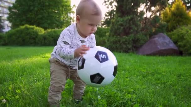 Cute Little Kid Playing Soccer Ball Park Slow Motion — Stock Video