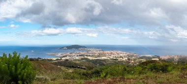 Landscape of the coast and city of Ceuta in Spain, place of coexistence of Christian and Arab cultures clipart