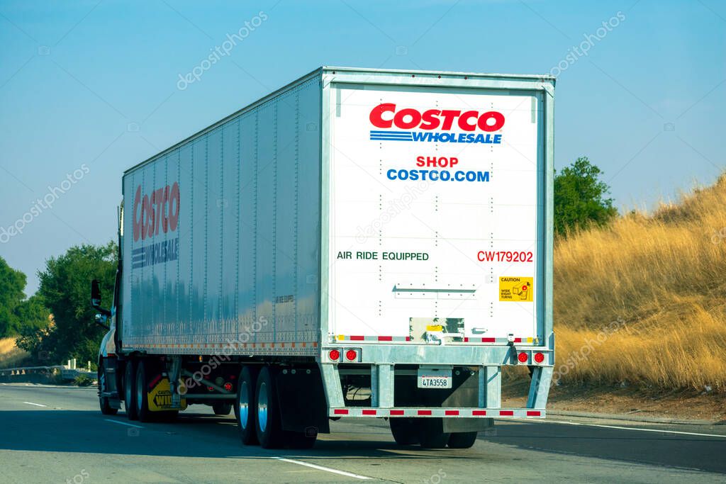 Costco Wholesale sign and logo on the side of delivery truck - San Jose, California, USA - 2020