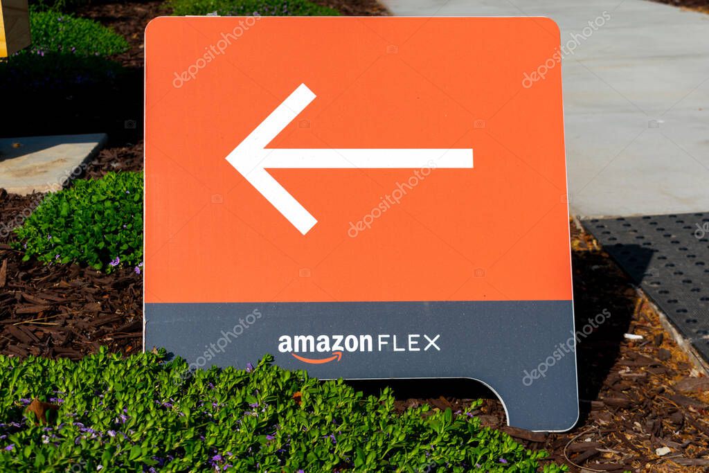 Amazon Flex sign directs independent contractors to delivery services at Amazon Flex Distribution Center - Newark, California, USA - 2020