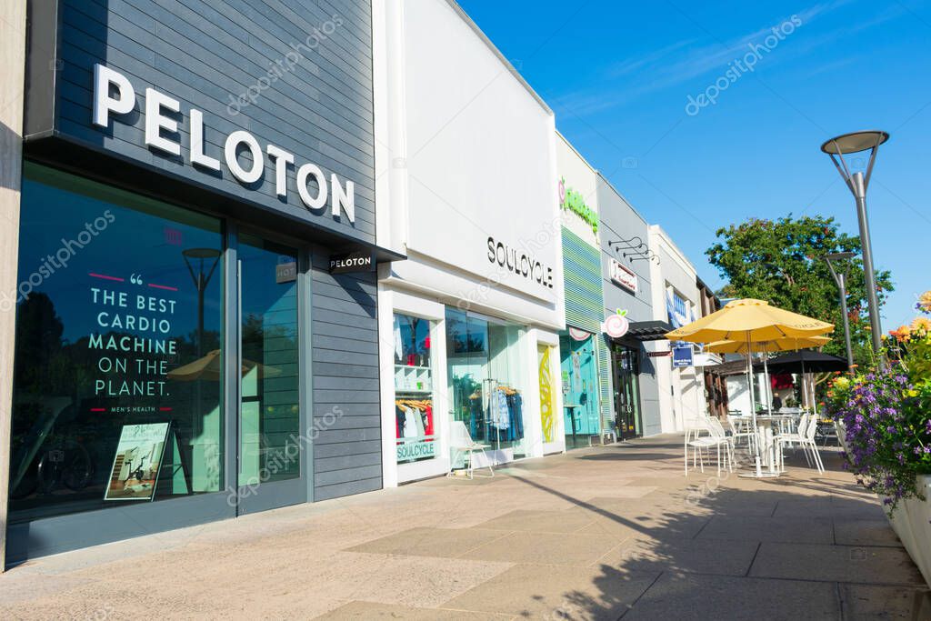 Peloton store exterior in upscale outdoor shopping center. Peloton Interactive is an exercise equipment company whose main product is a luxury stationary bicycle - Palo Alto, California, USA - 2019