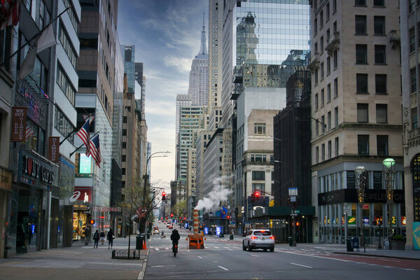 New York, NY / USA - April 26 2020: Empty road along 5th Avenue in Manhattan during coronavirus pandemic