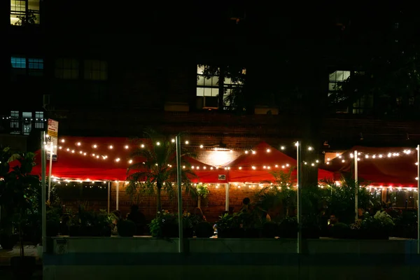 Outdoor dining at night in New York City because of pandemic law