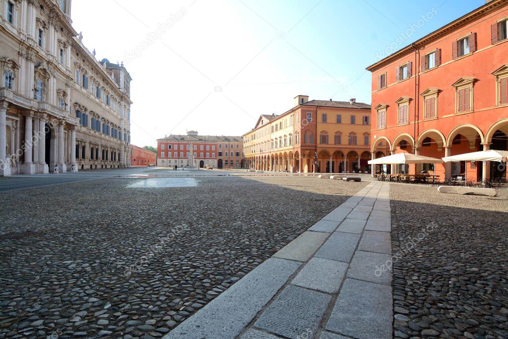 Italy /Modena  June 23, 2019: Piazza Roma and the Military Academy in Modena in Emilia-Romagna. It is known for its balsamic vinegar, opera and Ferrari and Lamborghini sports cars.