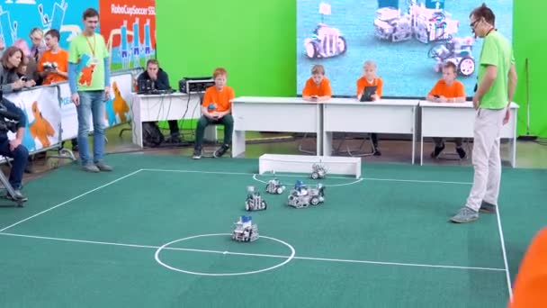 Russia, Saint-Petersburg October 6, 2018: RC robotic machines play football at the robotics exhibition "Robofinist" — Stock Video