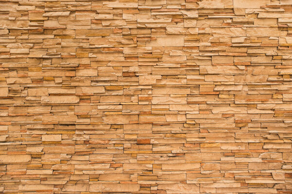 Background of stone wall made with blocks.