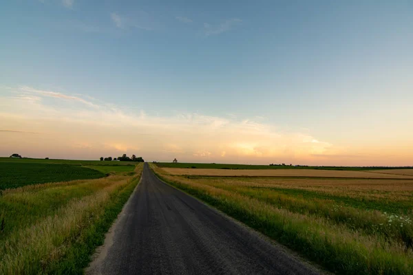 Sunset over the open road. — Stock Photo, Image