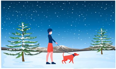 Kız köpeğiyle karda yürüyor.