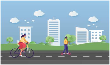 Kadın oğluyla birlikte yolda bisiklet sürüyor.