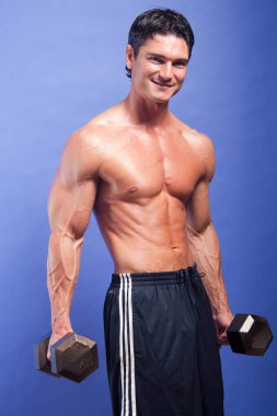 Seksi atlet kamera için poz veriyor..