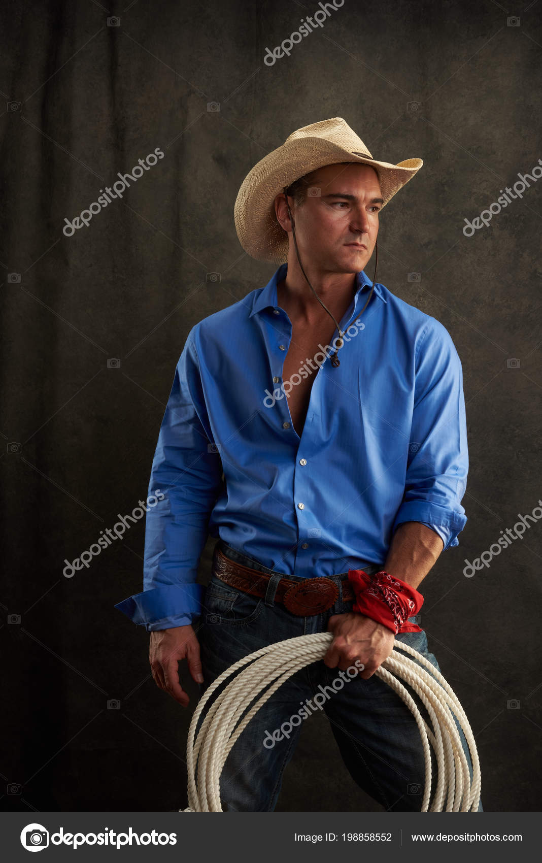Sexy Cowboy Wears Blue Shirt Stock Photo by ©romancephotos 198858552