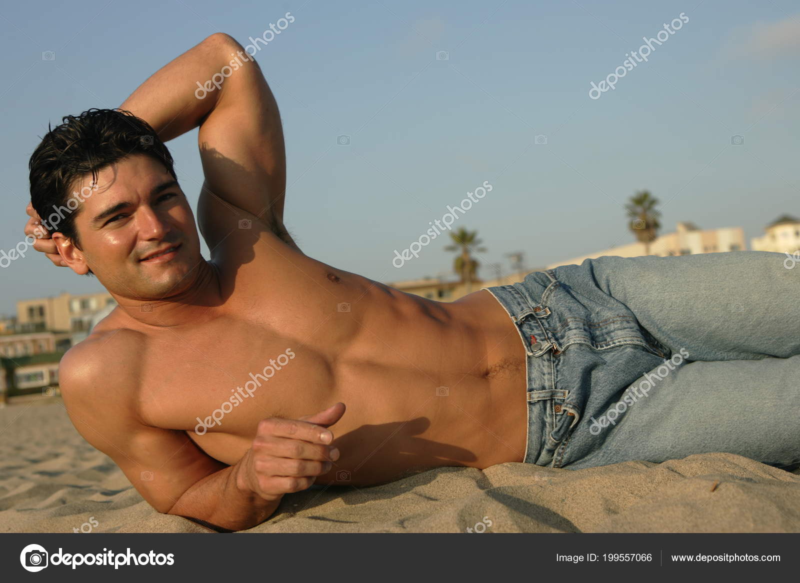 Stylish Young Man Enjoying Summer At Beach Stock Photo - Download Image Now  - Hooded Shirt, Sleeveless, Men - iStock