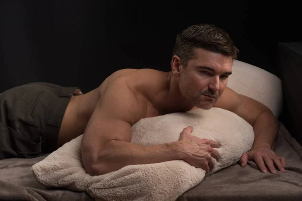 Handsome Man Relaxes Pillow — Stock Photo, Image