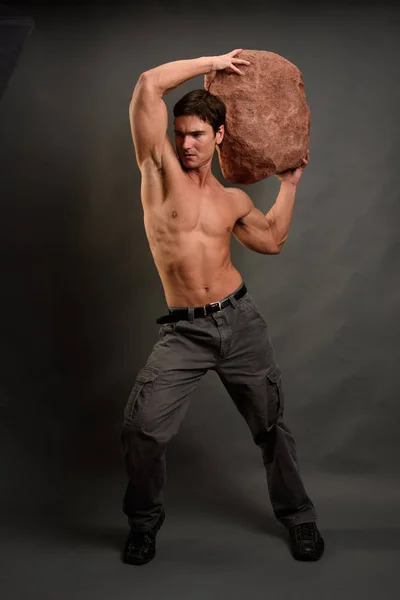 Sexy Man Holds Giant Boulder His Head — Stock Photo, Image