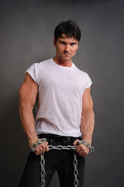 Sexy Man Holds Chain — Stock Photo, Image