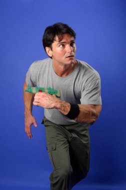 The military man poses for the photo.
