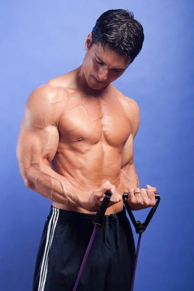 Hot Guy Works Out His Muscles — Stock Photo, Image