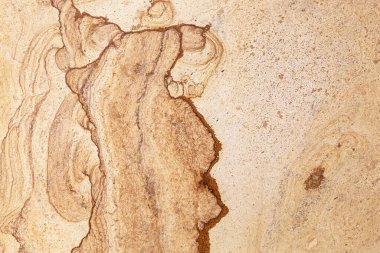 Parlatılmış sarı tuff duvarının eşsiz bir deseni, soyut bir arka plan, tasarımın dokusu. Sarı desenli Bakü tufa, soyut bir arkaplan ya da doku olarak