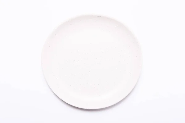 하얀색 바탕에 세라믹 접시. 위에서 본 풍경 — 스톡 사진